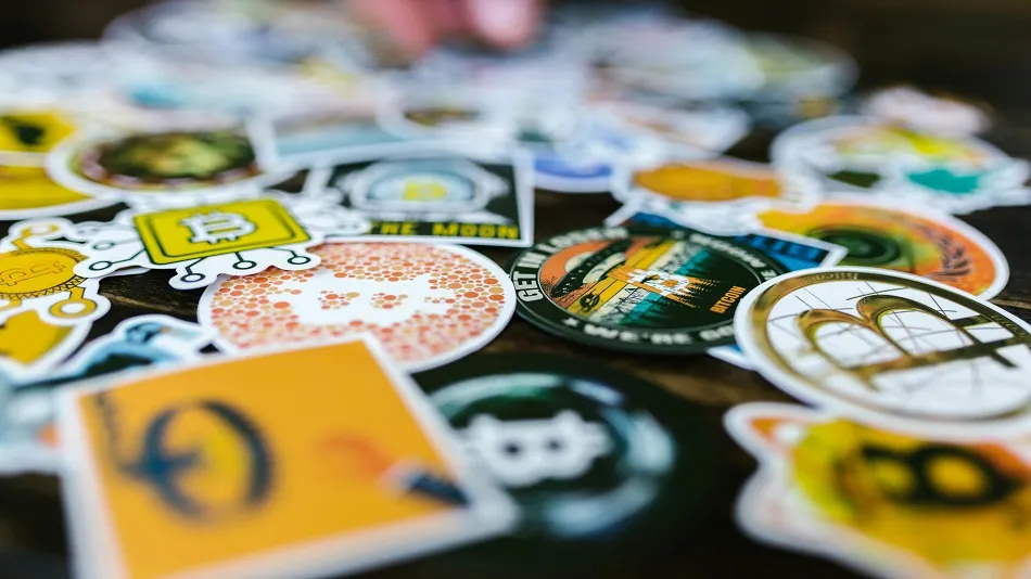 An image showing different Web3 crypto coins scattered